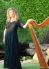 Pamela Copus of the group 2002 with Thormahlen harp