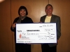 Executive Dorector Kevin Baird presents a check to The Epilepsy Foundation of America